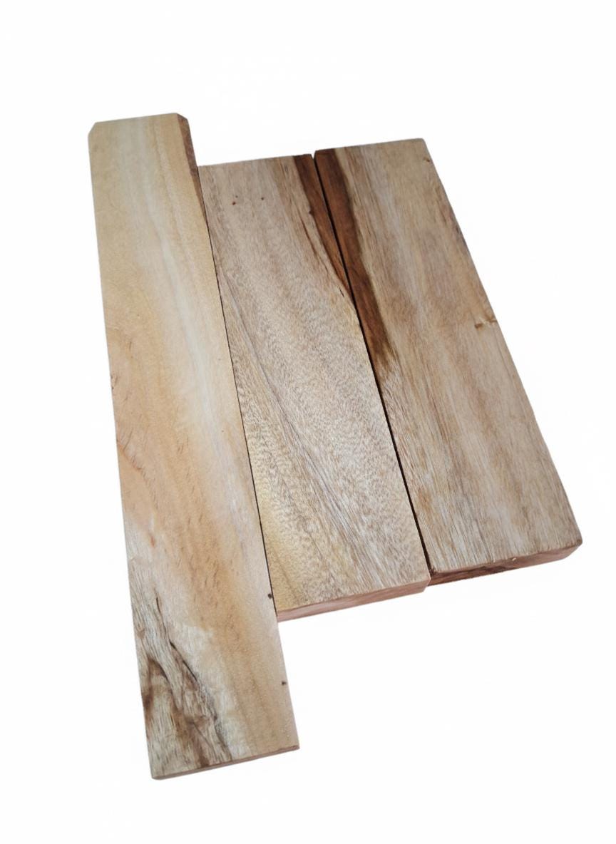 Eucalyptus wood set showing cream, reddish and chocolate-brown streaks