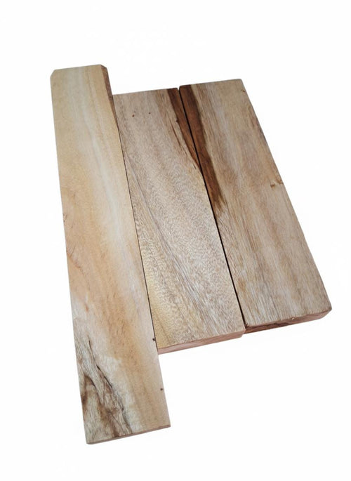 Eucalyptus wood set showing cream, reddish and chocolate-brown streaks