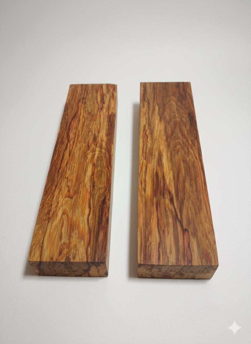 Figured Canary Wood blocks with golden tones and dark flowing grain