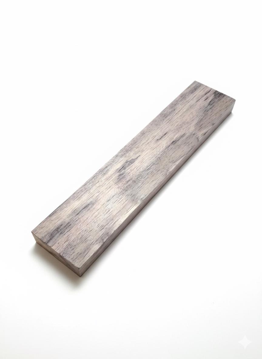 Long violet-toned exotic wood blank with muted mauve organic grain