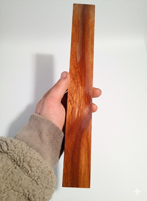 Deep red exotic hardwood blank with fine linear grain and rich color