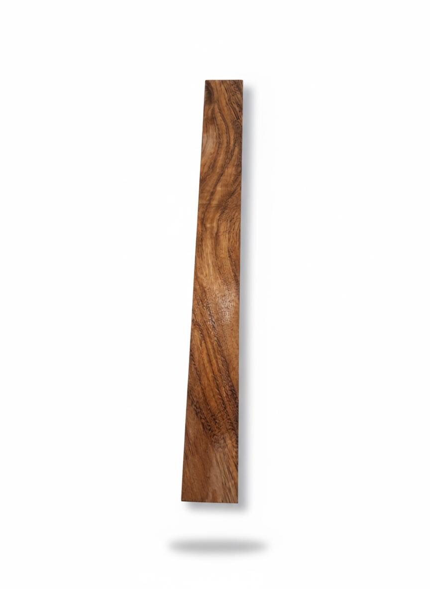 Unconfirmed exotic hardwood blank with warm golden-brown and dark ribbons