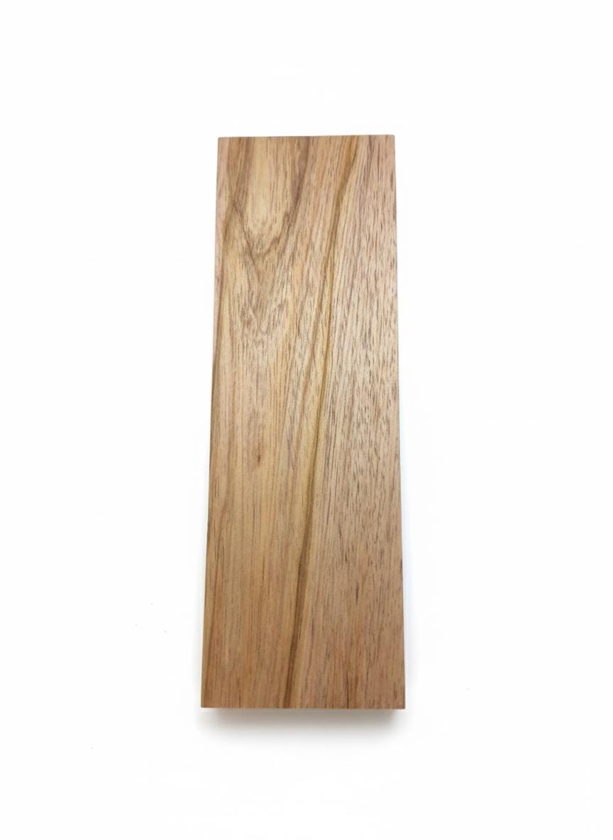 Dense exotic hardwood blank showing golden honey, olive and deep red-brown zones