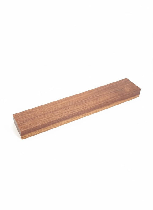 Long dense exotic wood blank with dark brown and warm amber grain