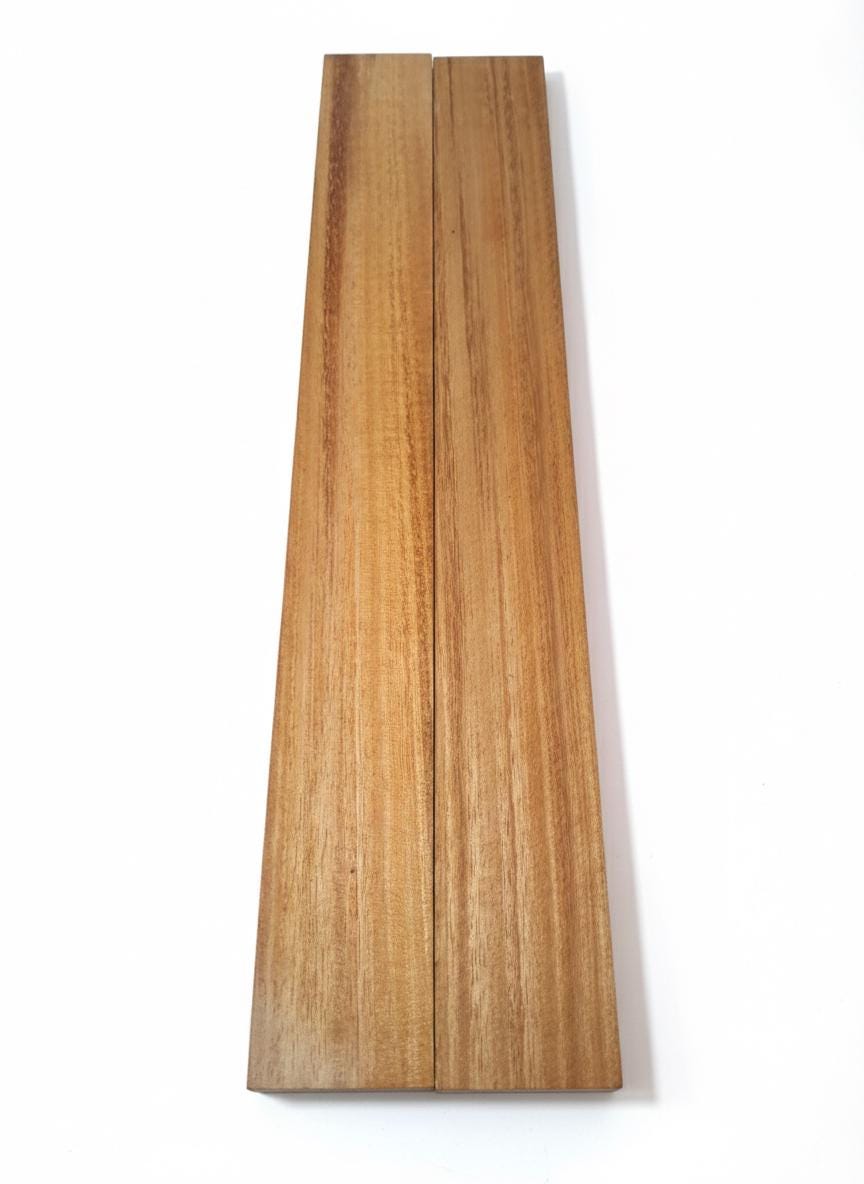 Golden exotic hardwood boards with straight grain and natural luster