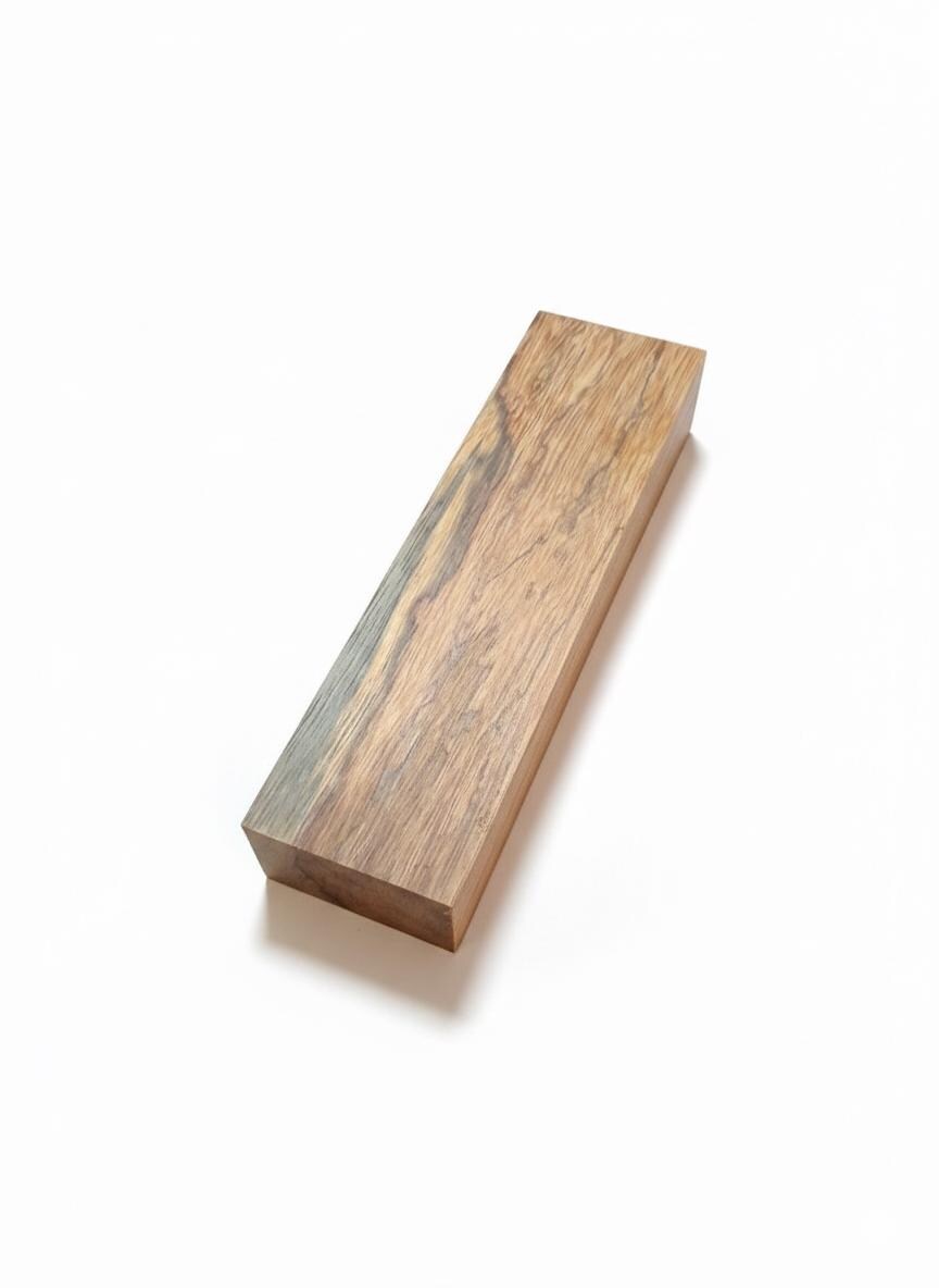 Canarywood exotic blank showing contrasting grain and mineral markings