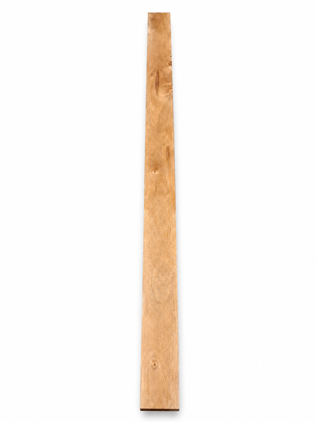 Long golden exotic hardwood board with fine silky grain