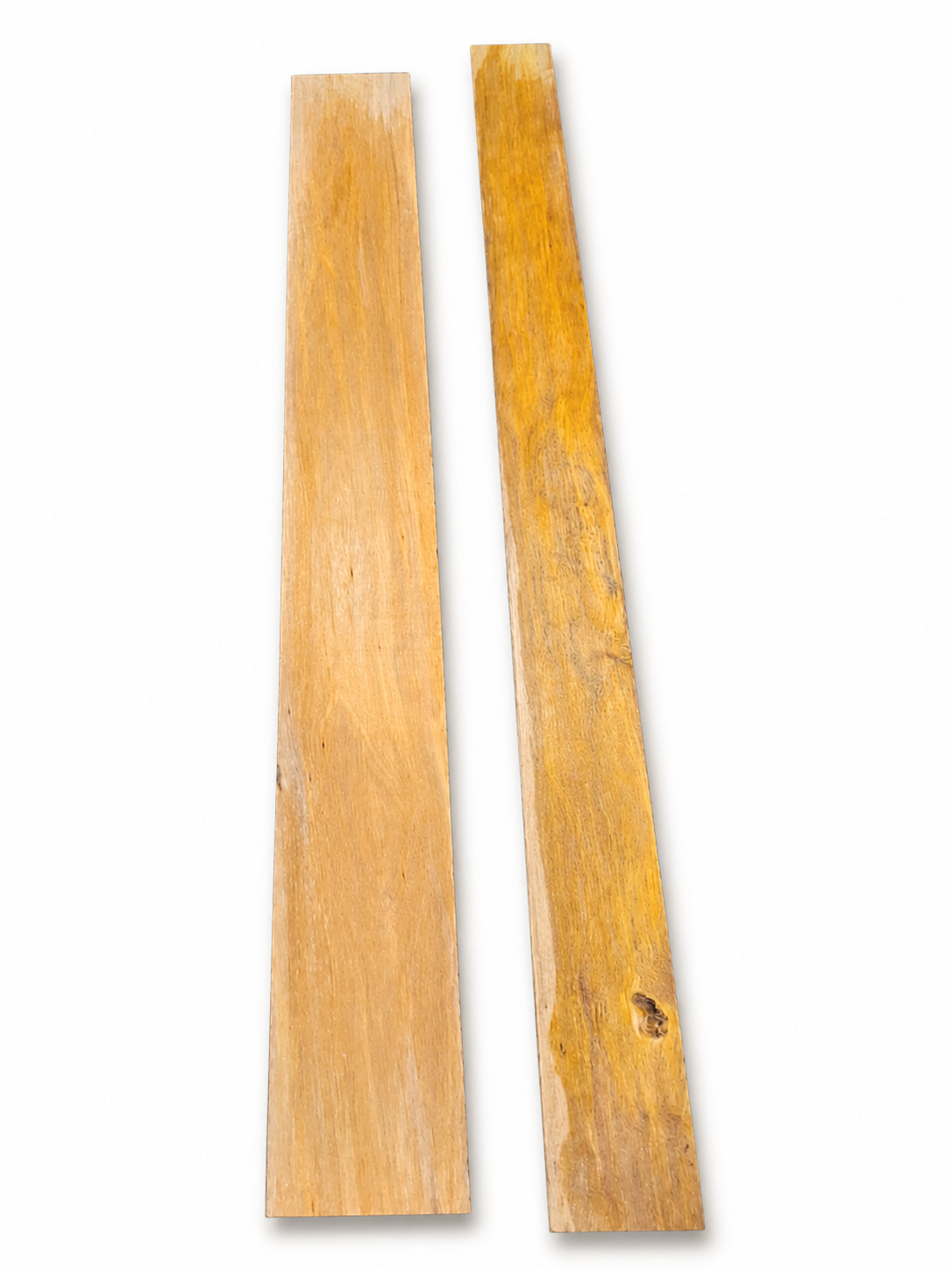Lot #26, three exotic hardwood long boards with pink-beige and honey tones
