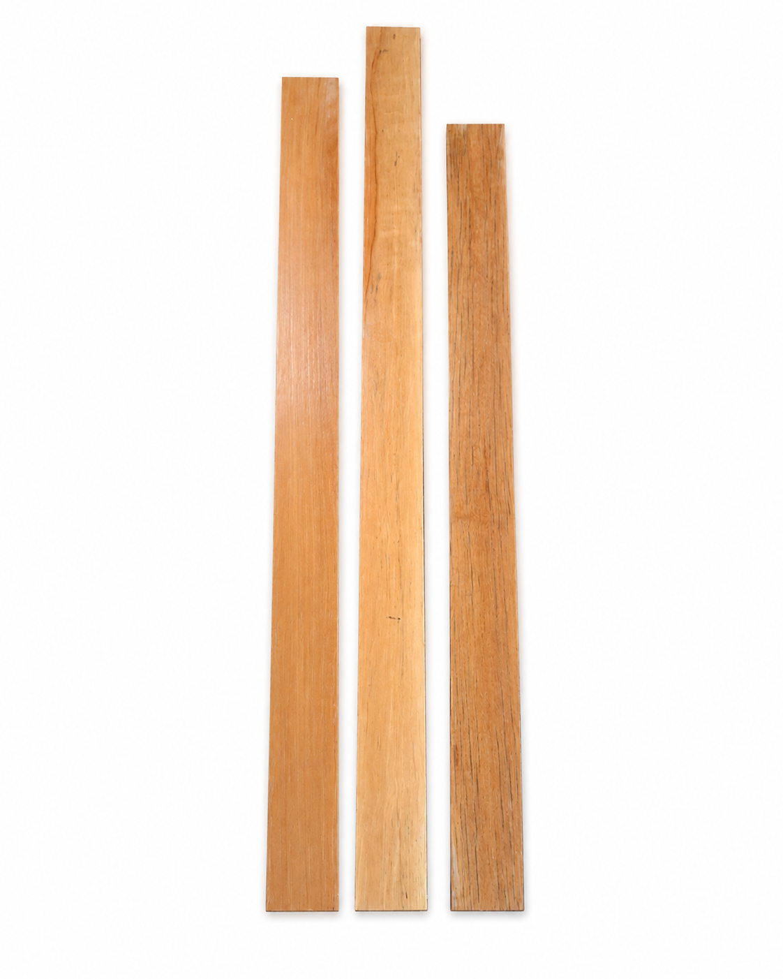Lot #49, three long exotic hardwood boards with honey-golden tones