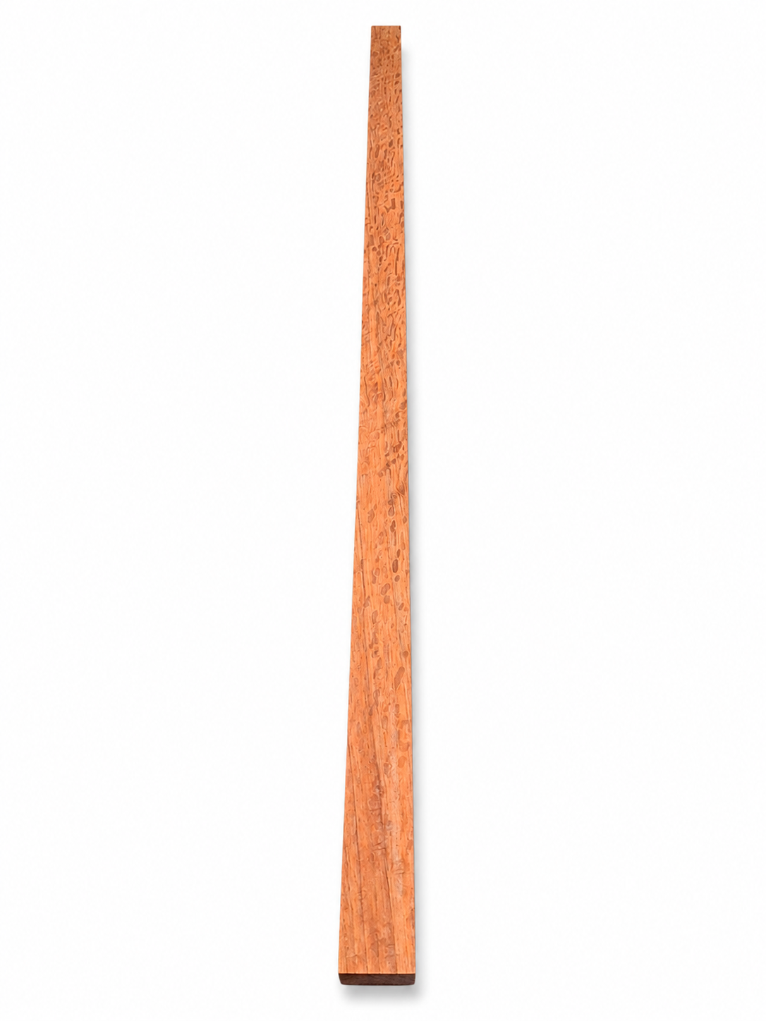 Long Signature exotic hardwood board with reddish-golden grain