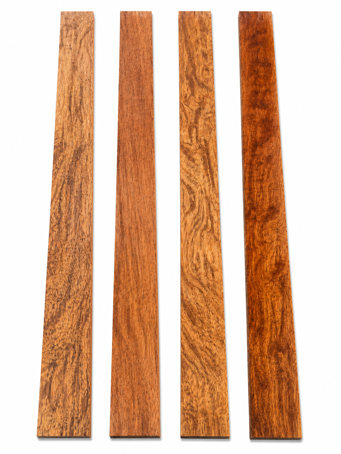 Lot #7, four flame-figured exotic hardwood boards with swirl grain